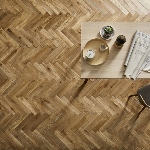 A beautiful oak wood real wood parquet herringbone pattern floor available from Ted Todd at Perthshire Flooring Scotland flooring provider.