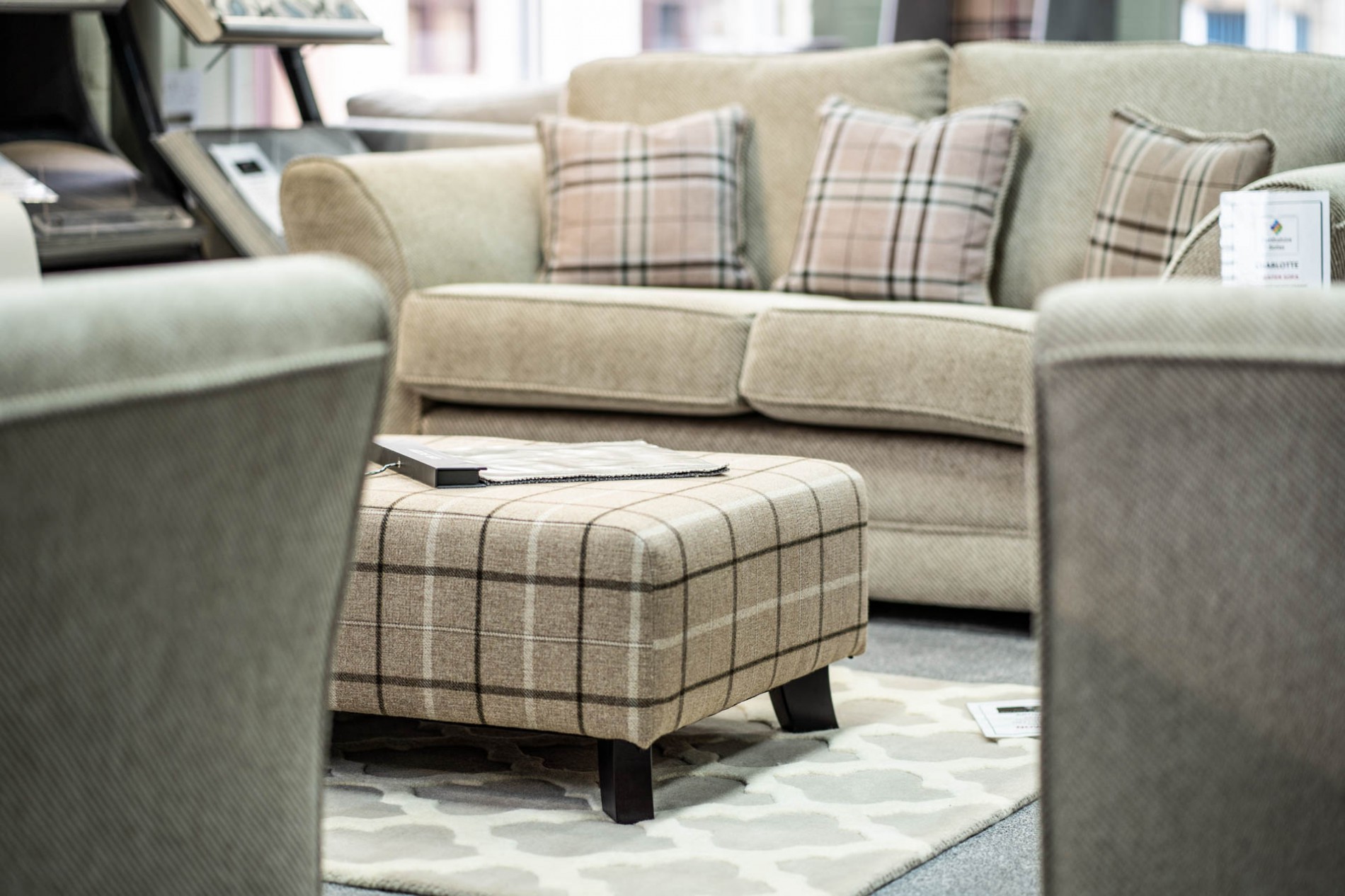 cream footrest and sofa at perthshire flooring